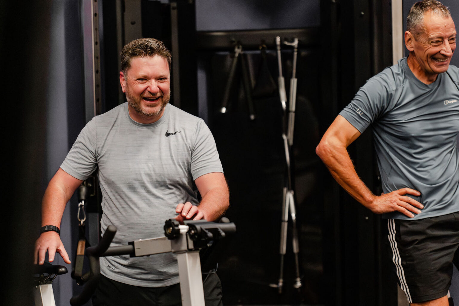 Two members laughing during a session